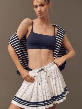 Anthropologie Yoga Golf the upside stellaurm Valletta pleated mini skirt